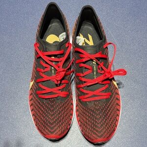 Nike Women's Red and Black Knit Running Sneakers with Yellow Accents